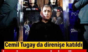 İzmir’de tarihi nöbet İzmir’de mülkiyet tartışmasına konu olan Meslek Fabrikası için verilen tahliye süresi doldu. Sabah saatlerinde polis ekipleri tarafından giriş çıkışların kapatıldığı bina önünde bekleyiş sürerken, İzmir Büyükşehir Belediye Başkanı Cemil Tugay da nöbet tutarak direnişe katıldı.